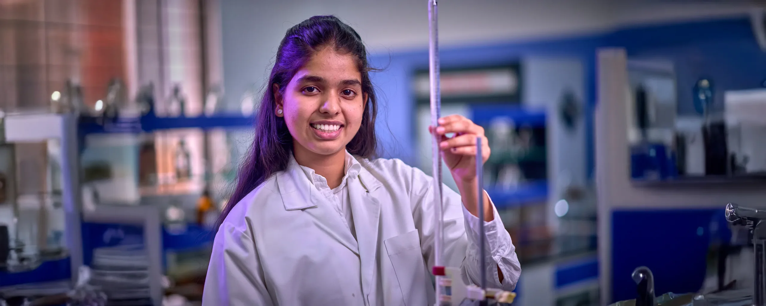 A student wearing the university's uniform.